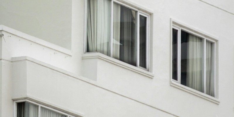 Close-up of Windows in an Apartment Building in City